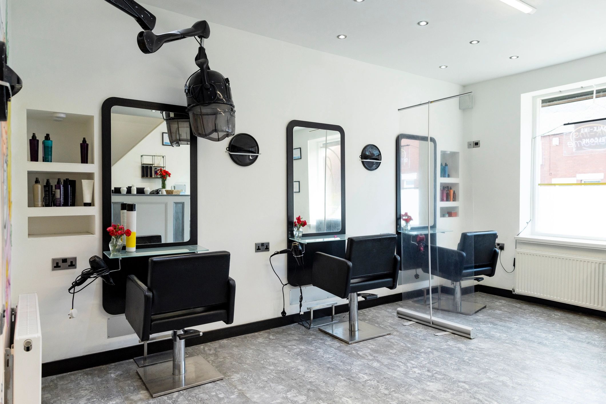 Modern salon interior with styling stations
