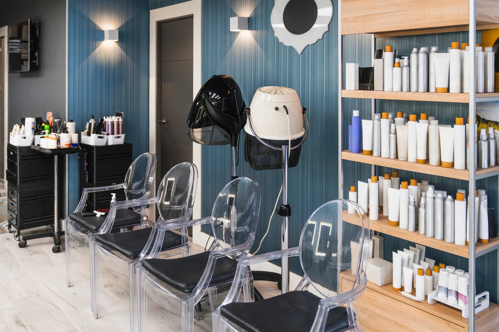 Bright hair salon interior with styling chairs and product displays